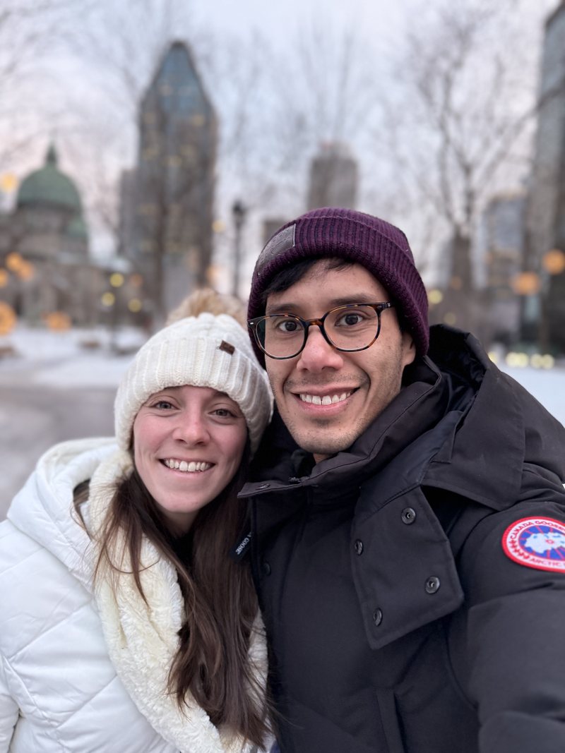 Bundled up in winter hats for a selfie in the cold