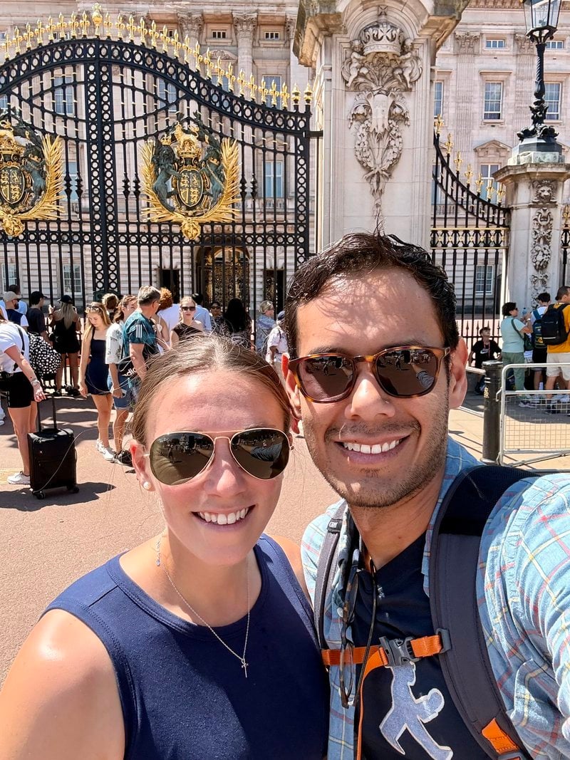 Selfie in front of ornate gilded gates